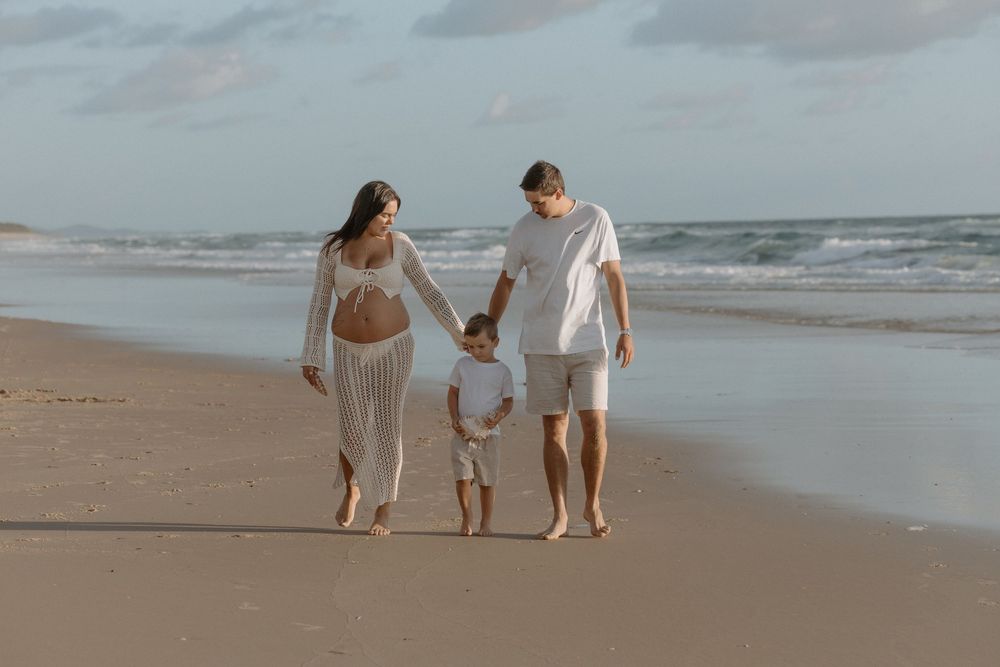 Sunrise golden hour Maternity photography session at Mudjima beach on the Sunshine Coast.