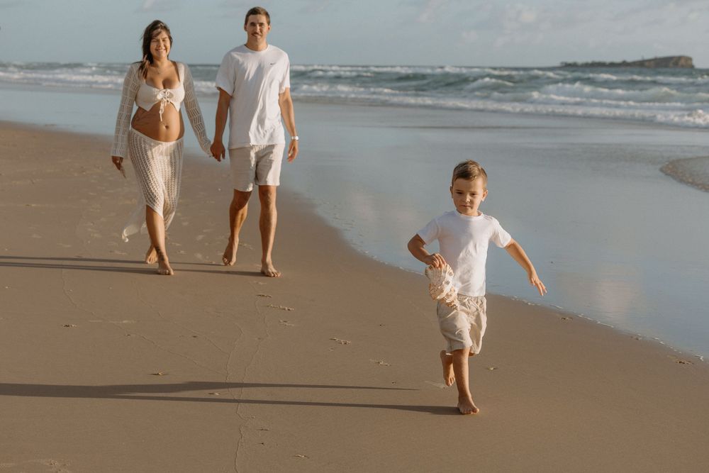 Sunrise golden hour Maternity photography session at Mudjima beach on the Sunshine Coast.