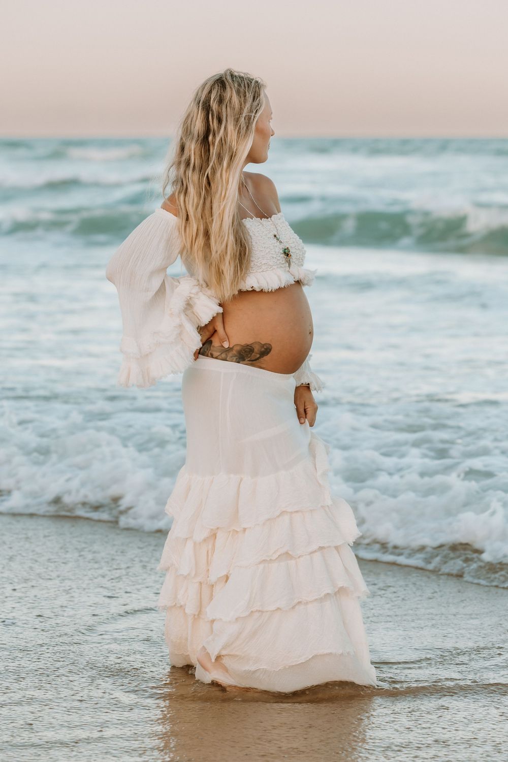 Sunset golden hour Maternity photography session at Mudjima beach on the Sunshine Coast.