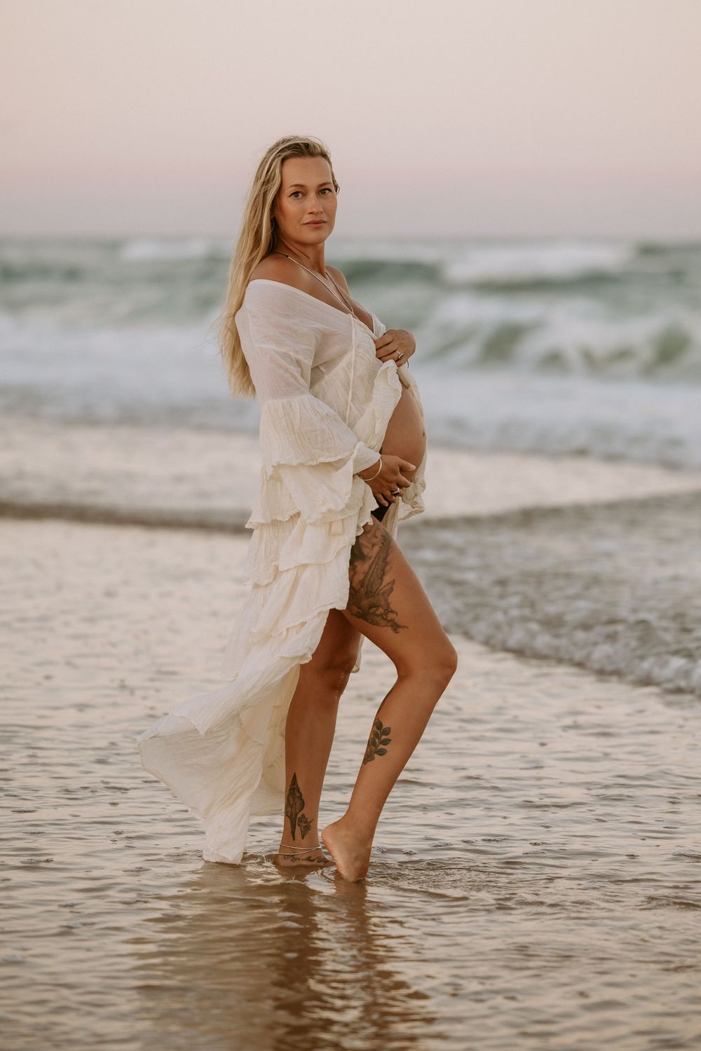 Sunset golden hour Maternity photography session at Mudjima beach on the Sunshine Coast.
