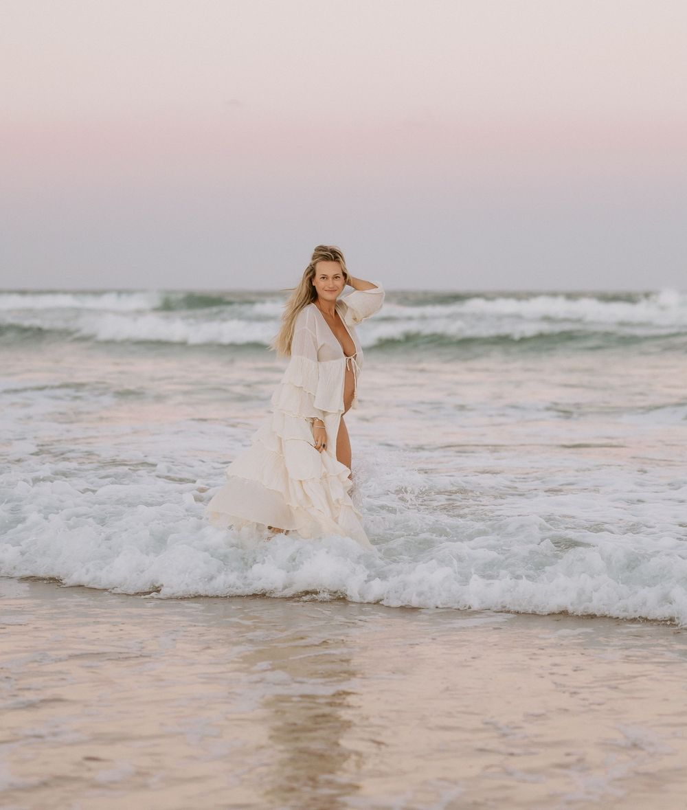 Sunset golden hour Maternity photography session at Mudjima beach on the Sunshine Coast.