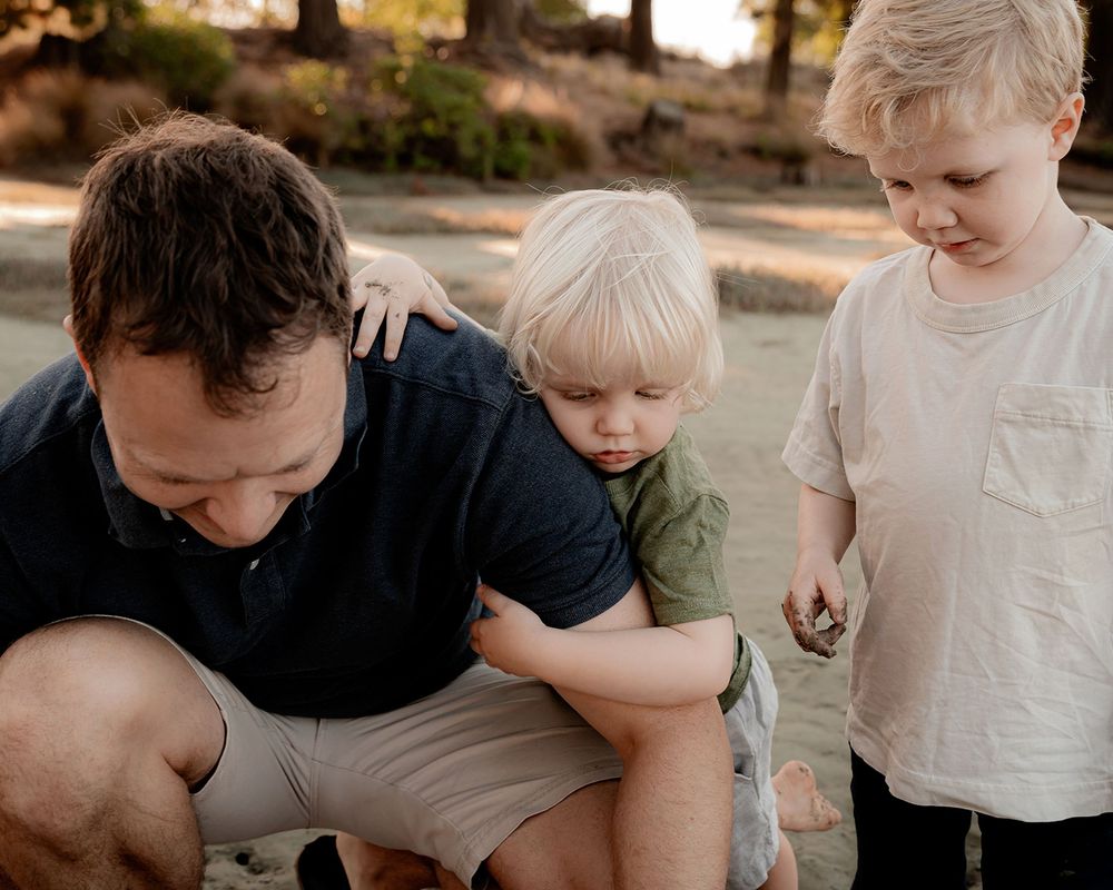 Family portrait at beach by Nelson photography
