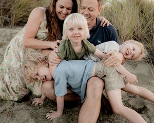Siblings embracing during family photography session