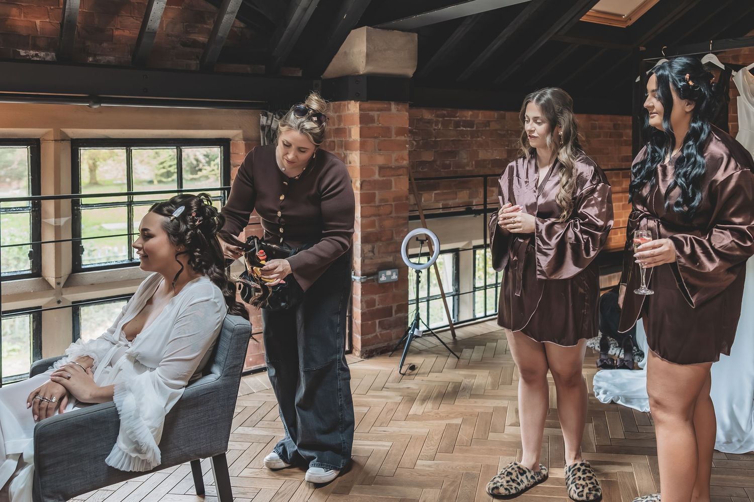 A relaxed morning bridal prep moment with close friends.