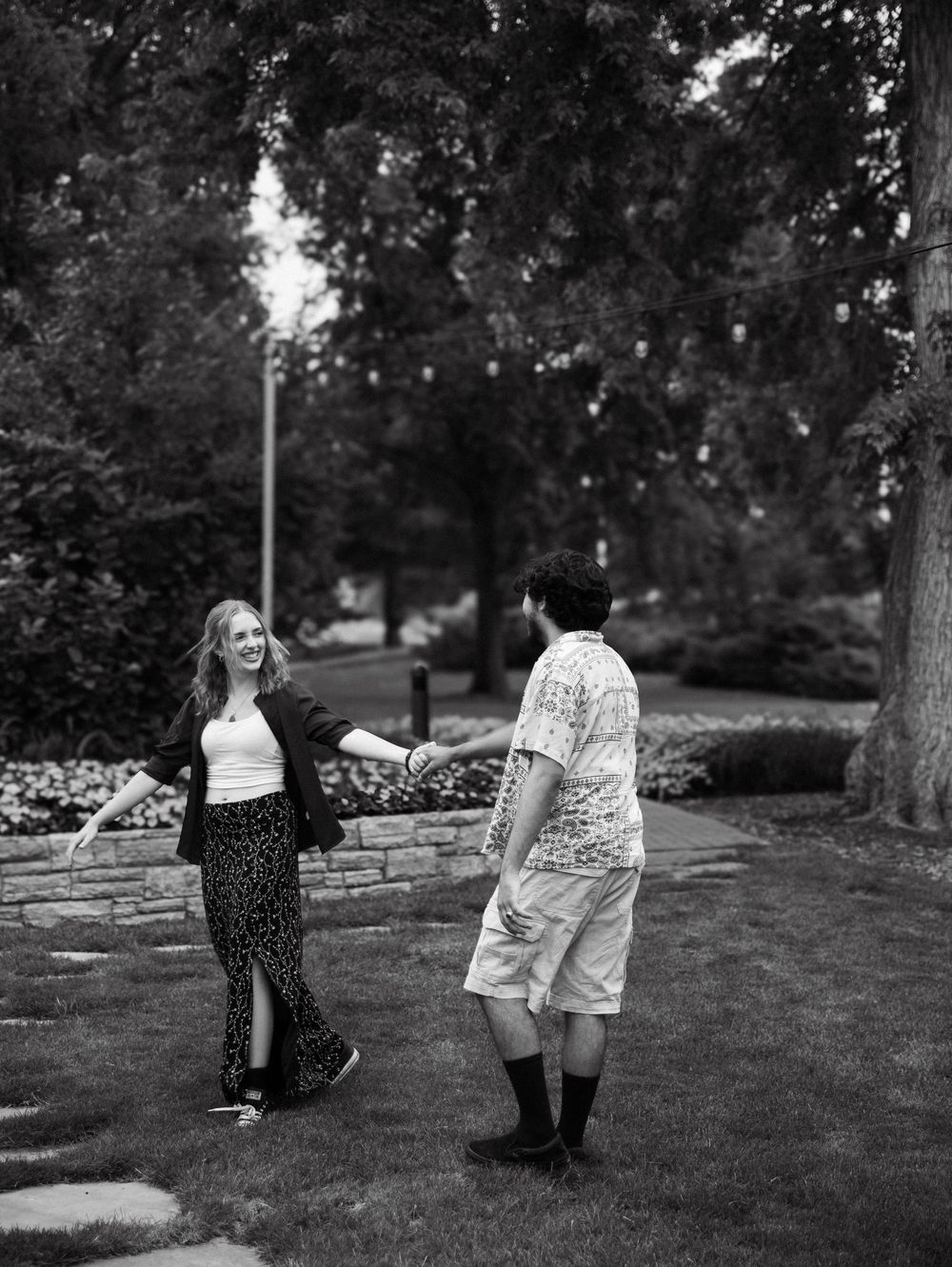 Couple dances with each other for candid couples, engagement photos, elopement, and cinematic photos in Denver, Colorado
