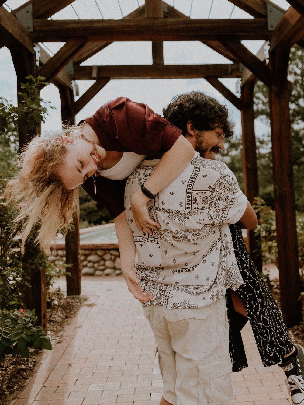 Couple embraces each other for candid couples, engagement photos, elopement, and cinematic photos in Denver, Colorado