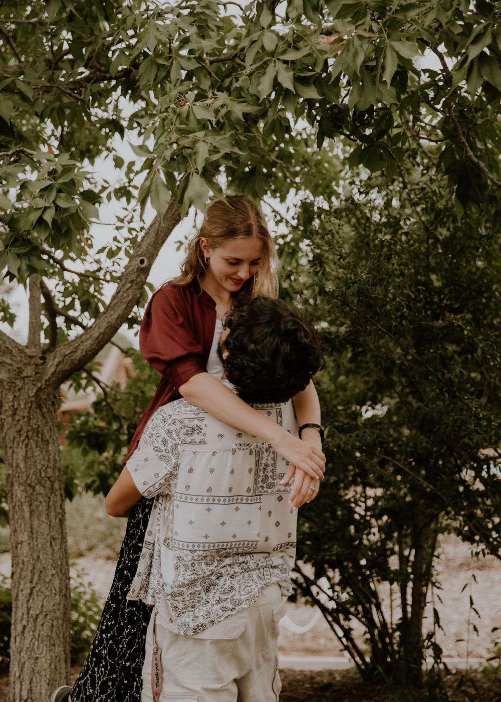Couple embraces each other for candid couples, engagement photos, elopement, and cinematic photos in Denver, Colorado
