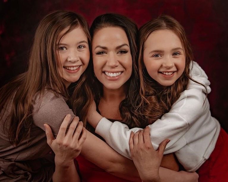 A collection of heartwarming family portraits with burgundy and brown tones showing embraces and joyful expressions.