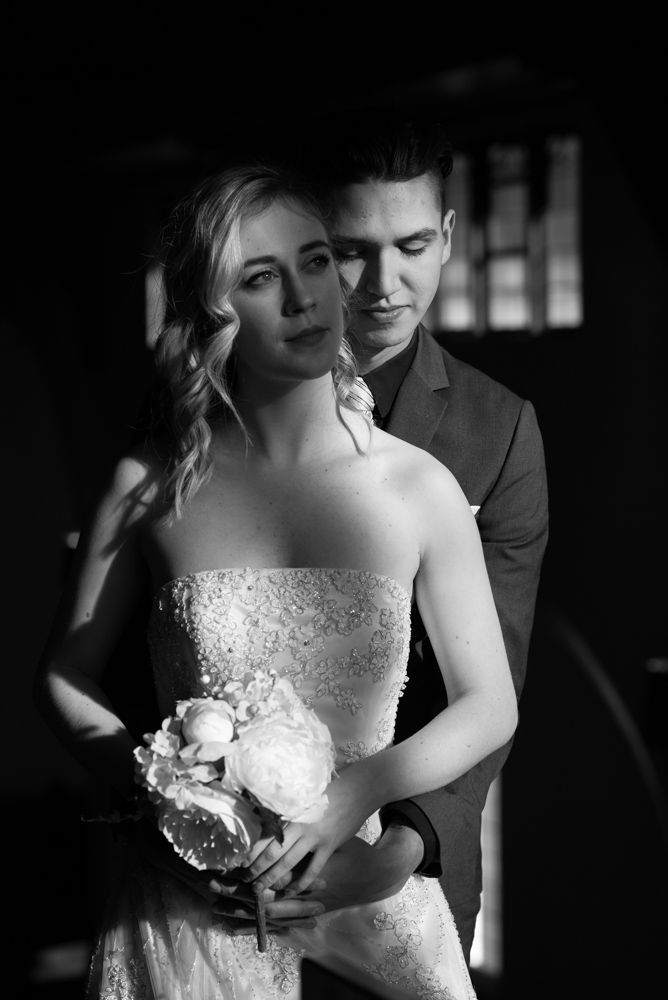 A romantic black and white wedding photo sequence shows tender moments between a couple in formal attire.