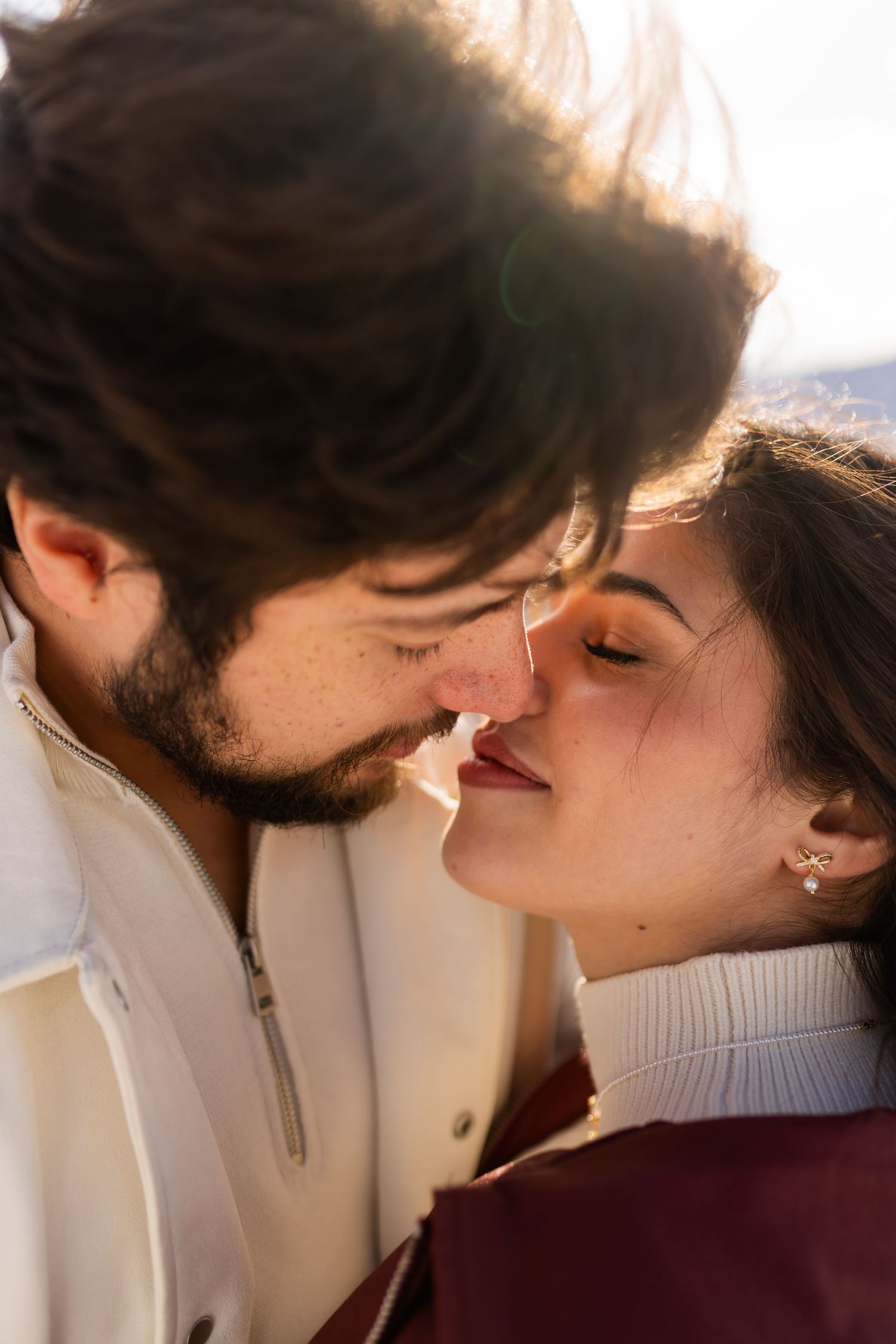 Close-up couple portrait during Utah engagement session, warm light and intimate connection