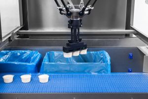 Brilopak packing machines and robotic arms on a modern factory floor-12