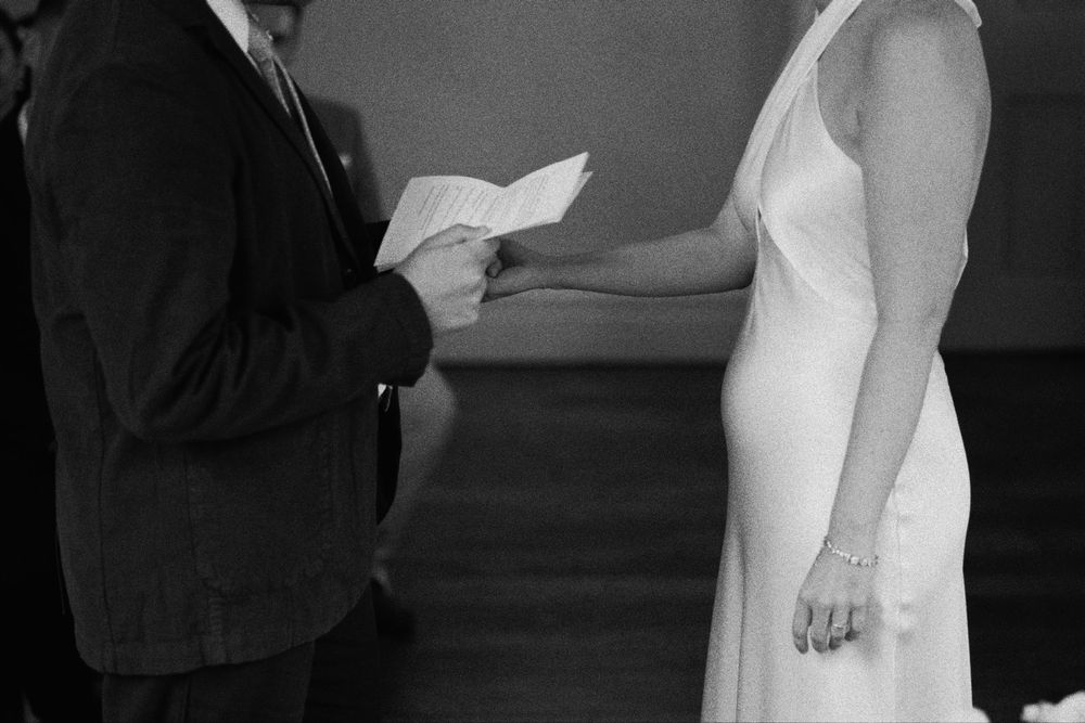 Groom reads his vows to his bride at a Clissold House London wedding.