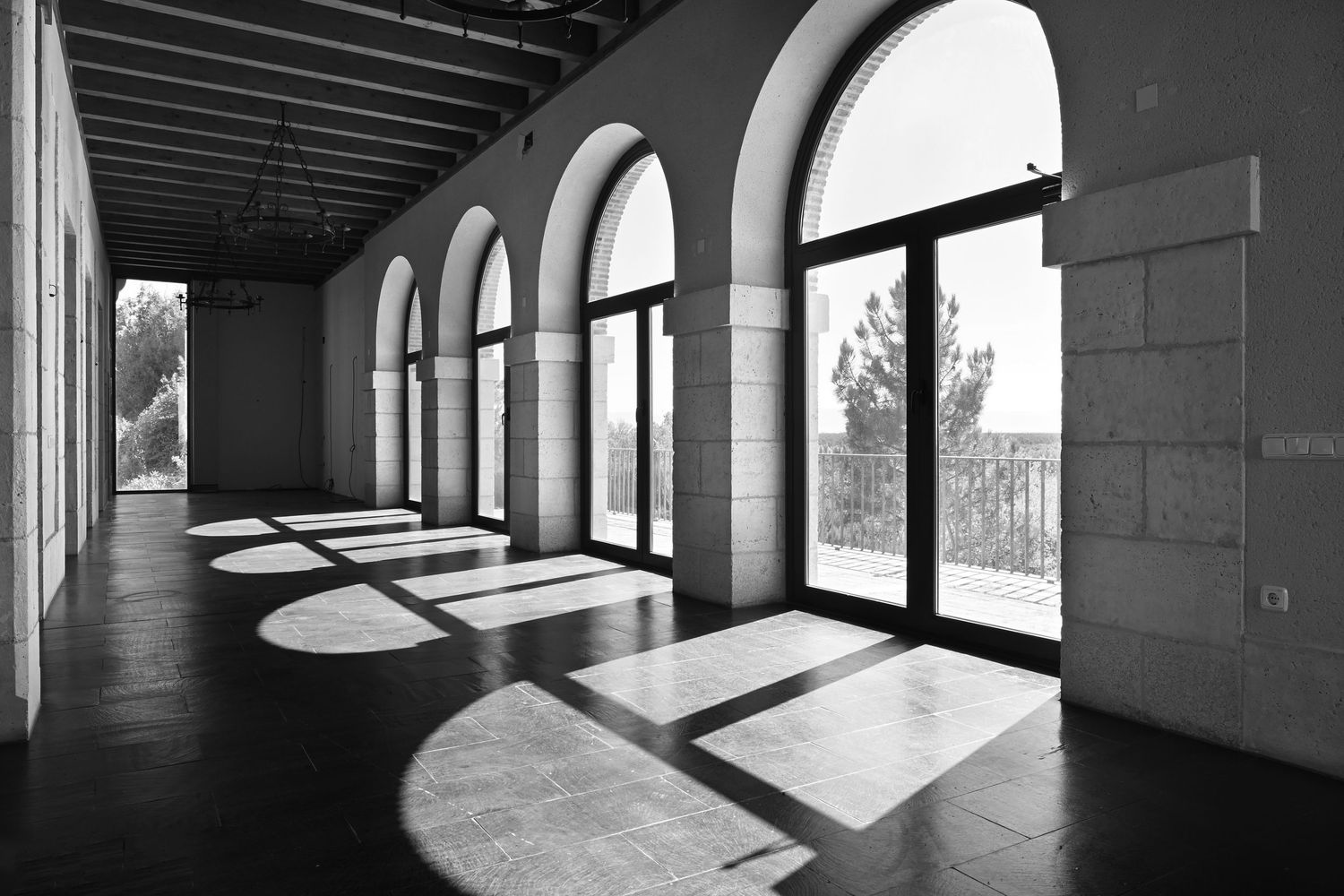 Moksa Design at Palacio La Serrata, Segovia Spain - arched windows in main hall