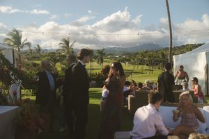 guests mingling at Kauai wedding by Kauai Wedding Photographer