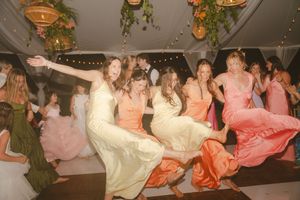 bridesmaids dancing at kauai wedding by Kauai Wedding Photographer