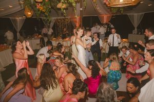 couple dancing and laughing at Kauai wedding by Kauai Wedding Photographer