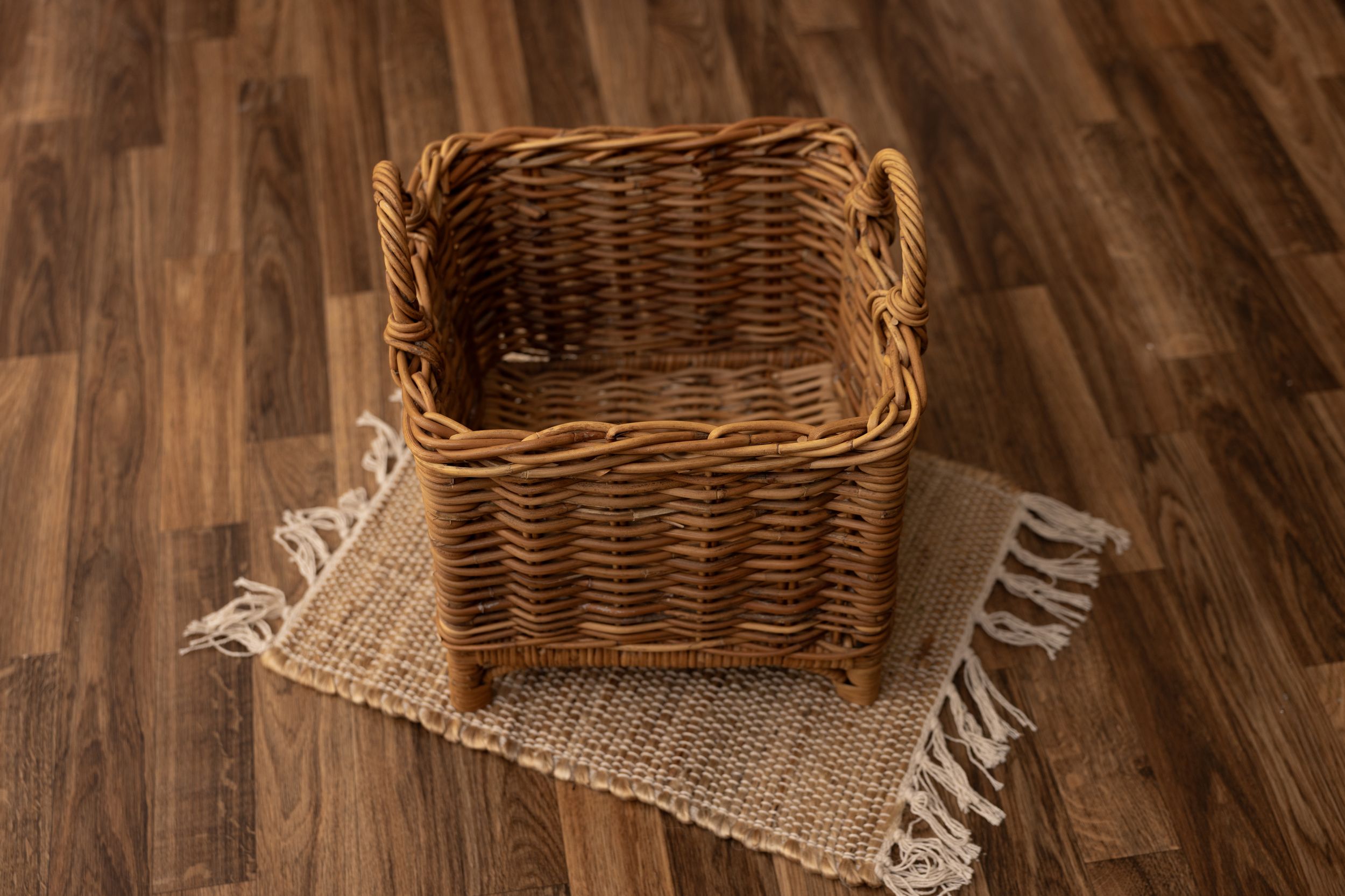 Wicker basket with legs and two handles