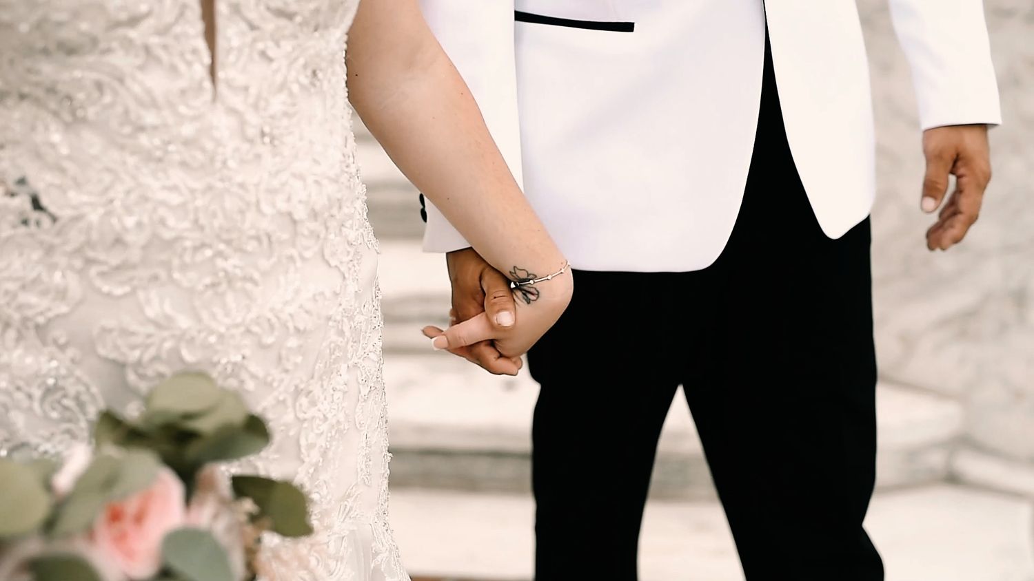 A series of wedding photos showing details of rings, hands, and formal attire in black and white.