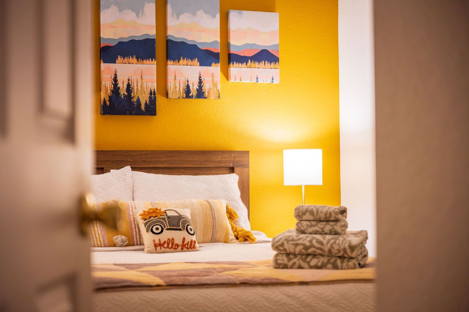 Image of a warm, cozy bedroom by Denver Hospitality, Travel & Tourism photographer Captain Colorado Photography.
