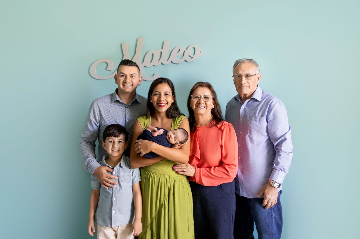 A series of four family group photos arranged horizontally against a light blue background.