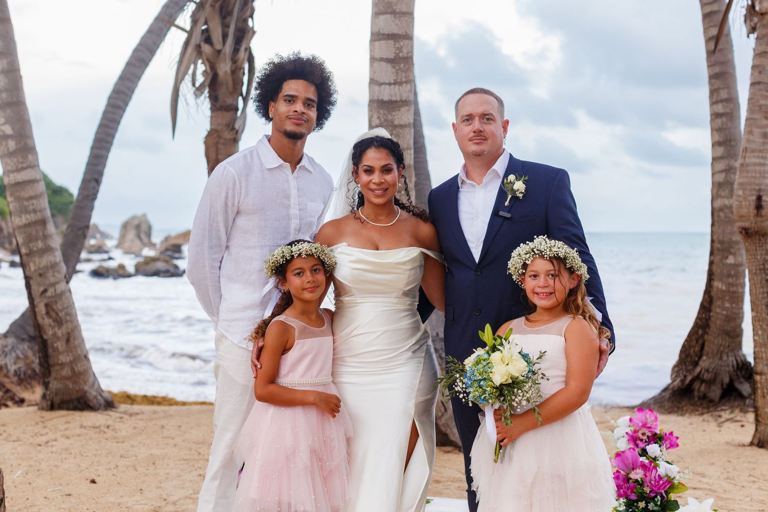Family portrait. Intimate beach wedding in Palmas del Mar, Puerto Rico.