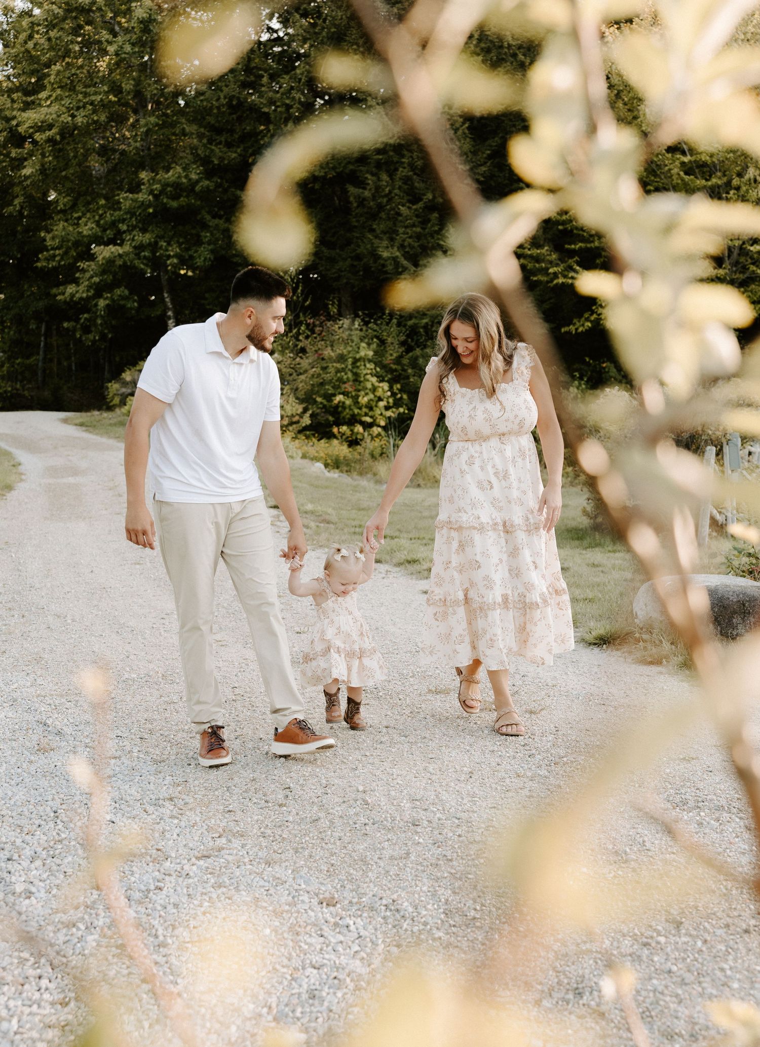 Outdoor maternity photoshoot for a couple in New Hampshire.