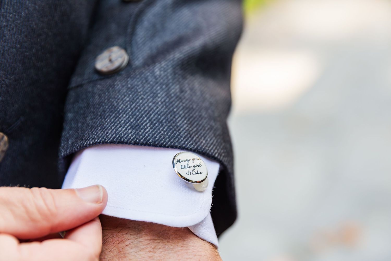 Close-up detail shots of formal wedding attire including suit lapels, buttons, and fabric textures.