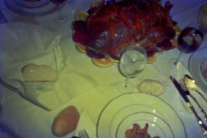 Close-up shots of various prepared food dishes on plates.