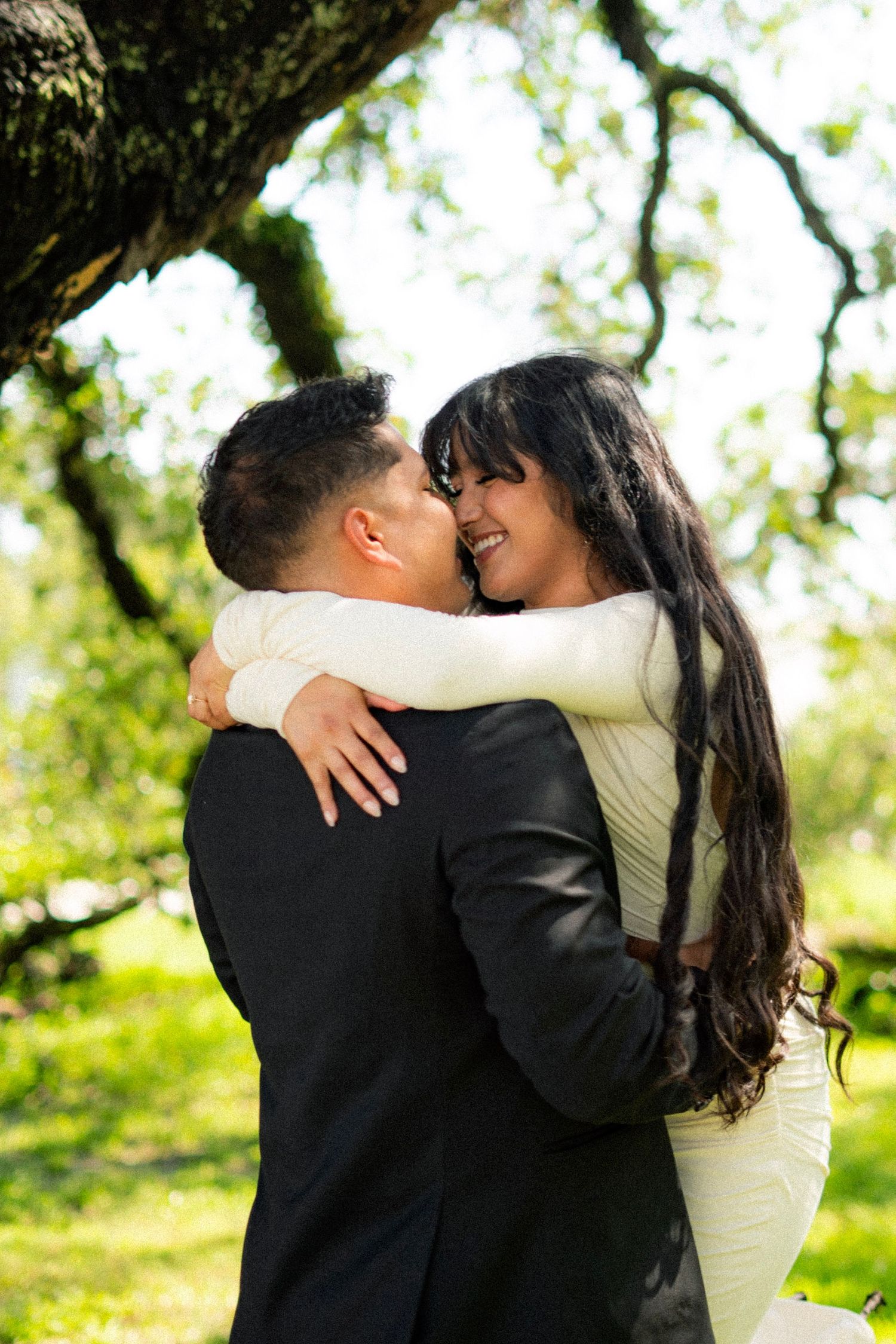 Engagement session outdoors in Houston, TX. Natural light, candid moments, lifestyle photography, timeless documenting, couple photography.