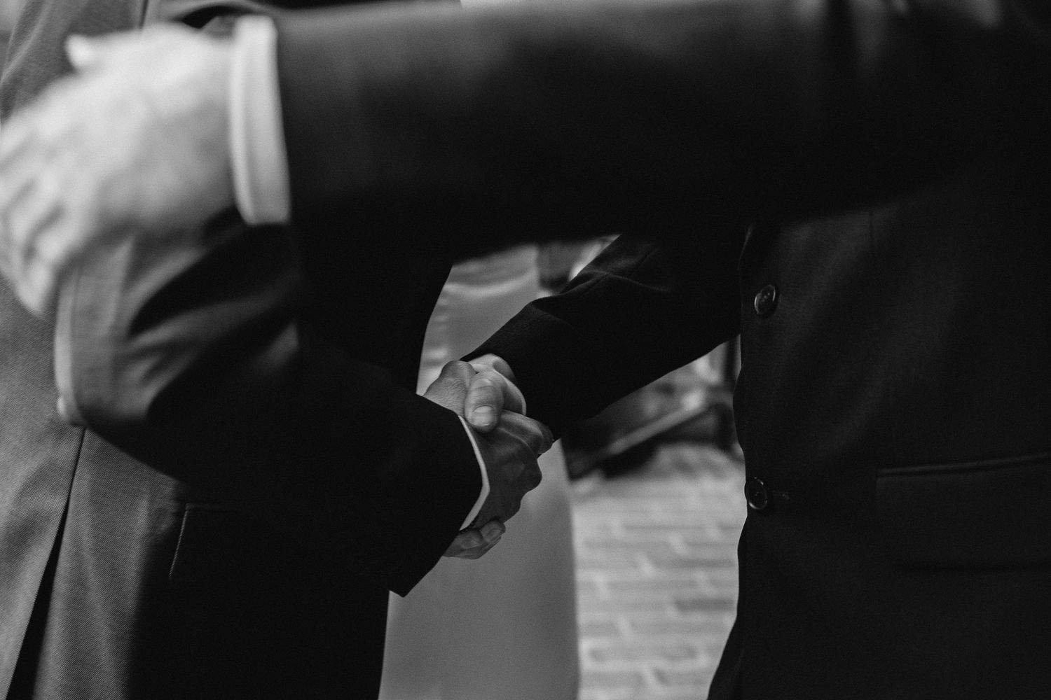 Los Angeles Wedding Photography of handshake in film