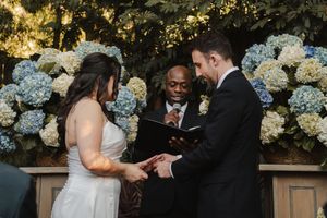 Bride and groom exchanging vows during their Pasadena wedding ceremony