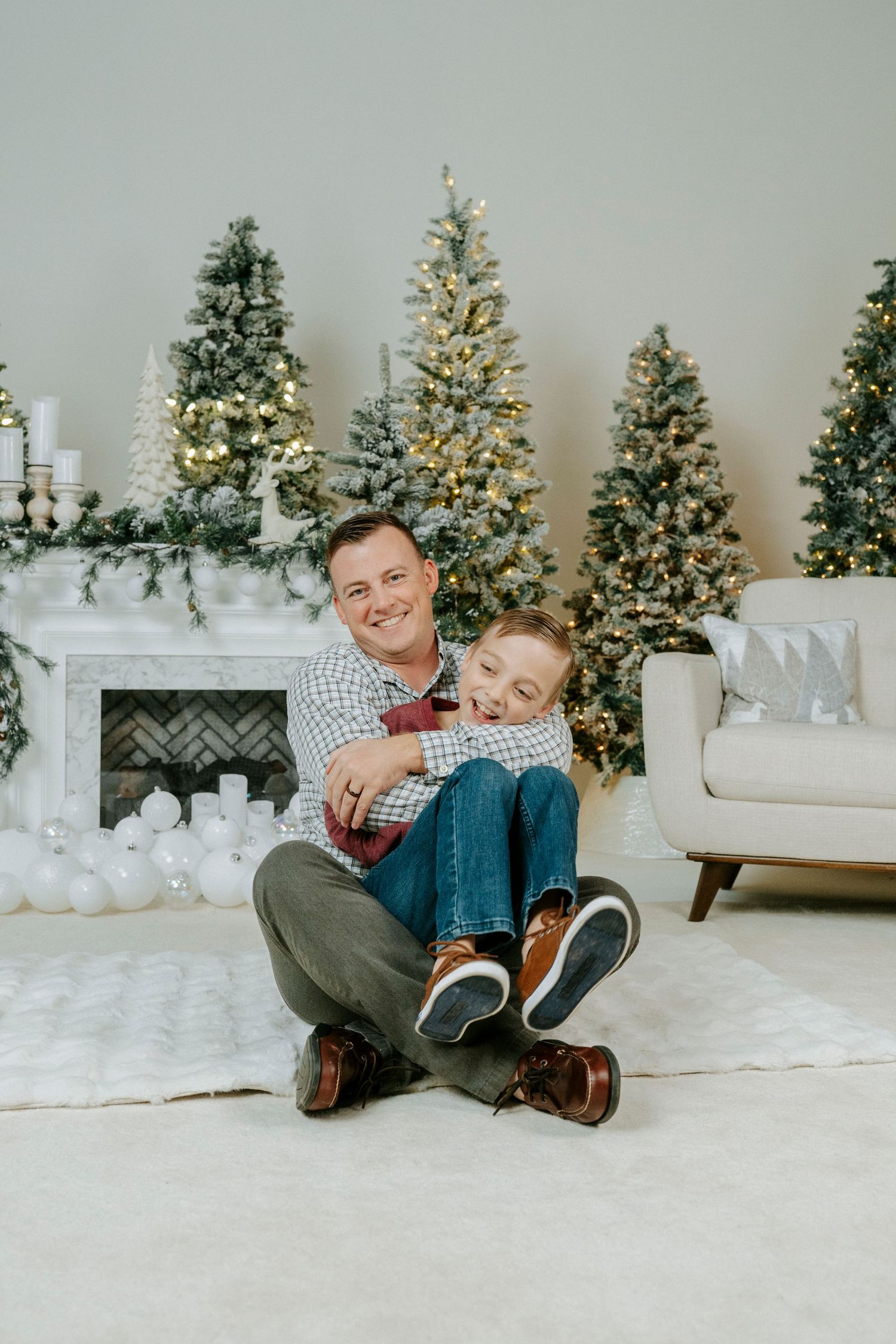 A series of four photos showing a cozy Christmas scene with decorated trees, white furniture, and people relaxing together.