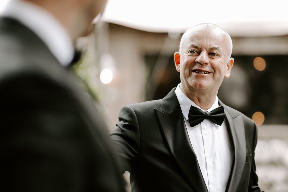 A wedding photo collage showing candid moments of people in formal attire at an elegant celebration.
