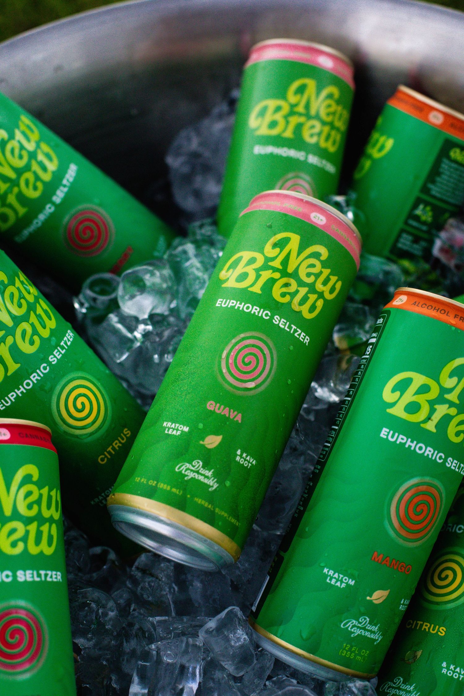 Green New Brew euphoric seltzer cans chilling in ice bucket.
