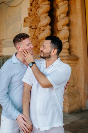 LGBTQ+ couple proposal with skyline backdrop in Montjuïc
