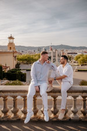 Gay couple celebrating engagement in Montjuïc Barcelona