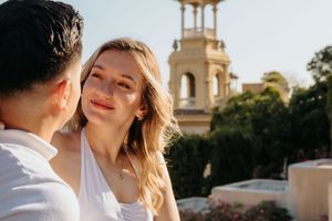 Couple laughing together during a Montjuïc photoshoot