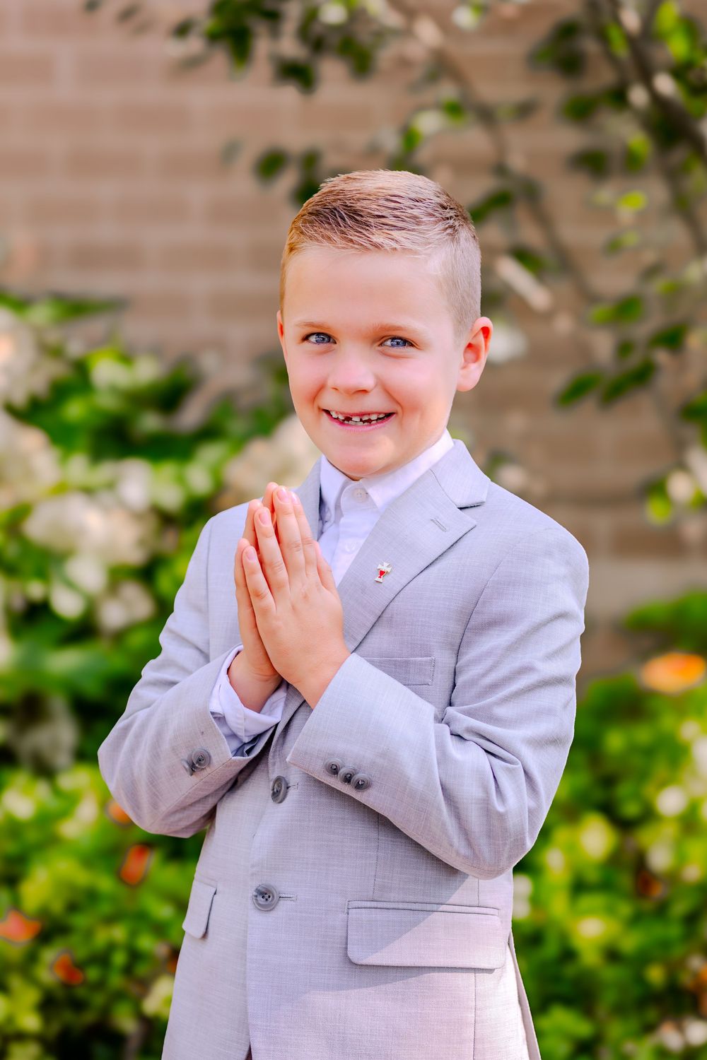 Close-up child celebrating his First Holy Communion photo with sharp detail, warm colors, and natural expression.