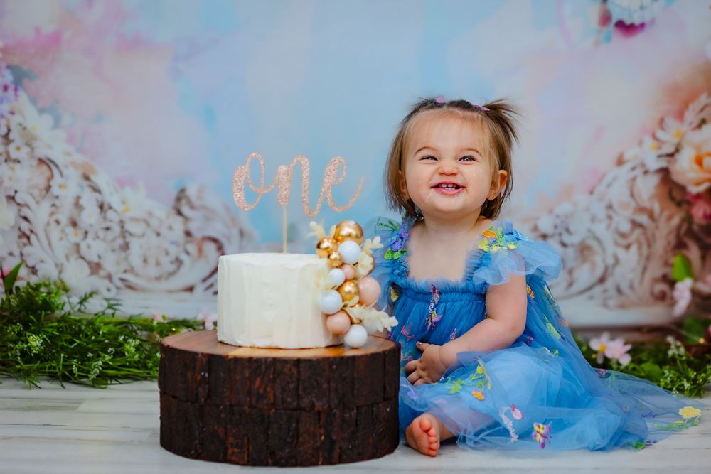 The sweetest first birthday session filled with bright colors, big smiles, and picture-perfect memories