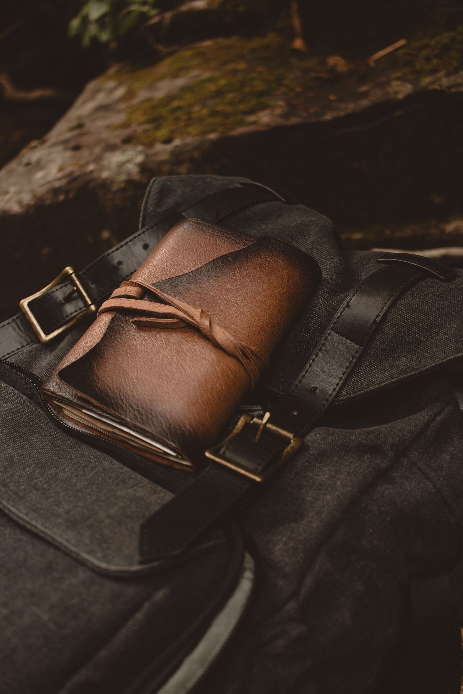 product photography, outdoor, nature, lifestyle, water, dark, moody, photographer, journal, moss, hiking, backpack, backpacking