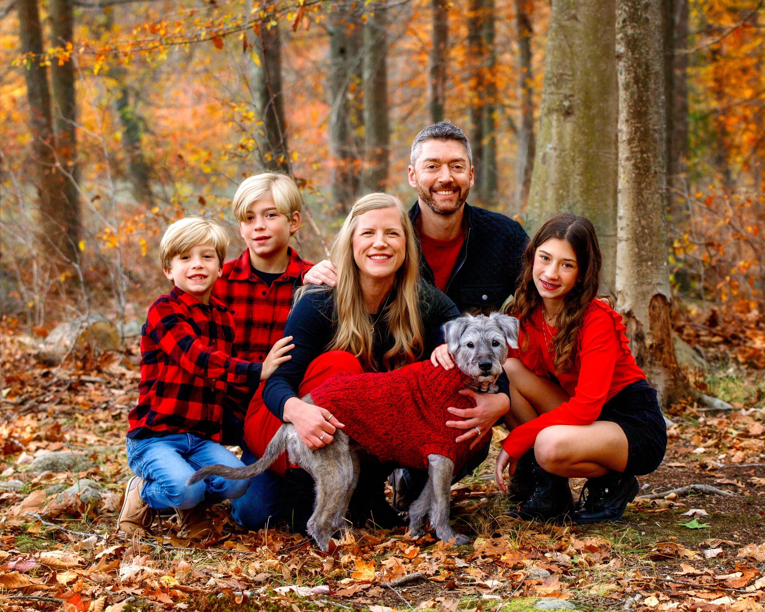 Bergen County family Photographer captures family with dog for mini session near Franklin Lakes, NJ.  Family is matching and happy.