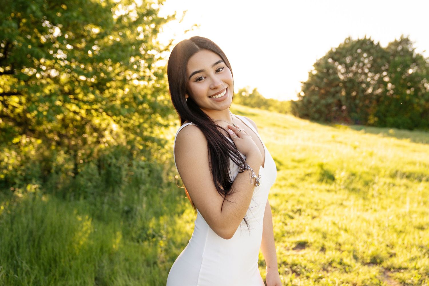 senior facing forward in outdoor field in Plano