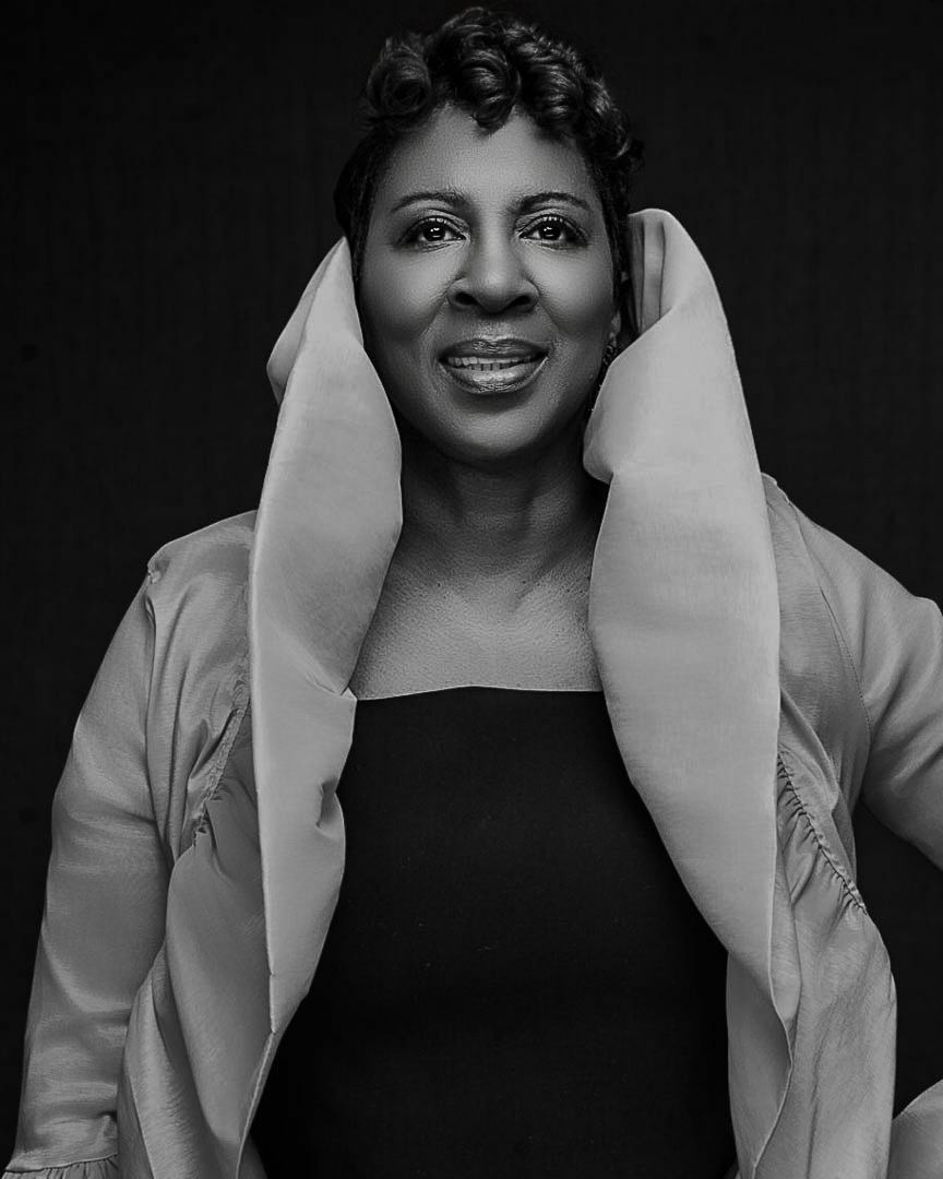 Black and white portrait series showing progressive emotional expressions in dramatic lighting with white phone props. Kelly Photography Atl