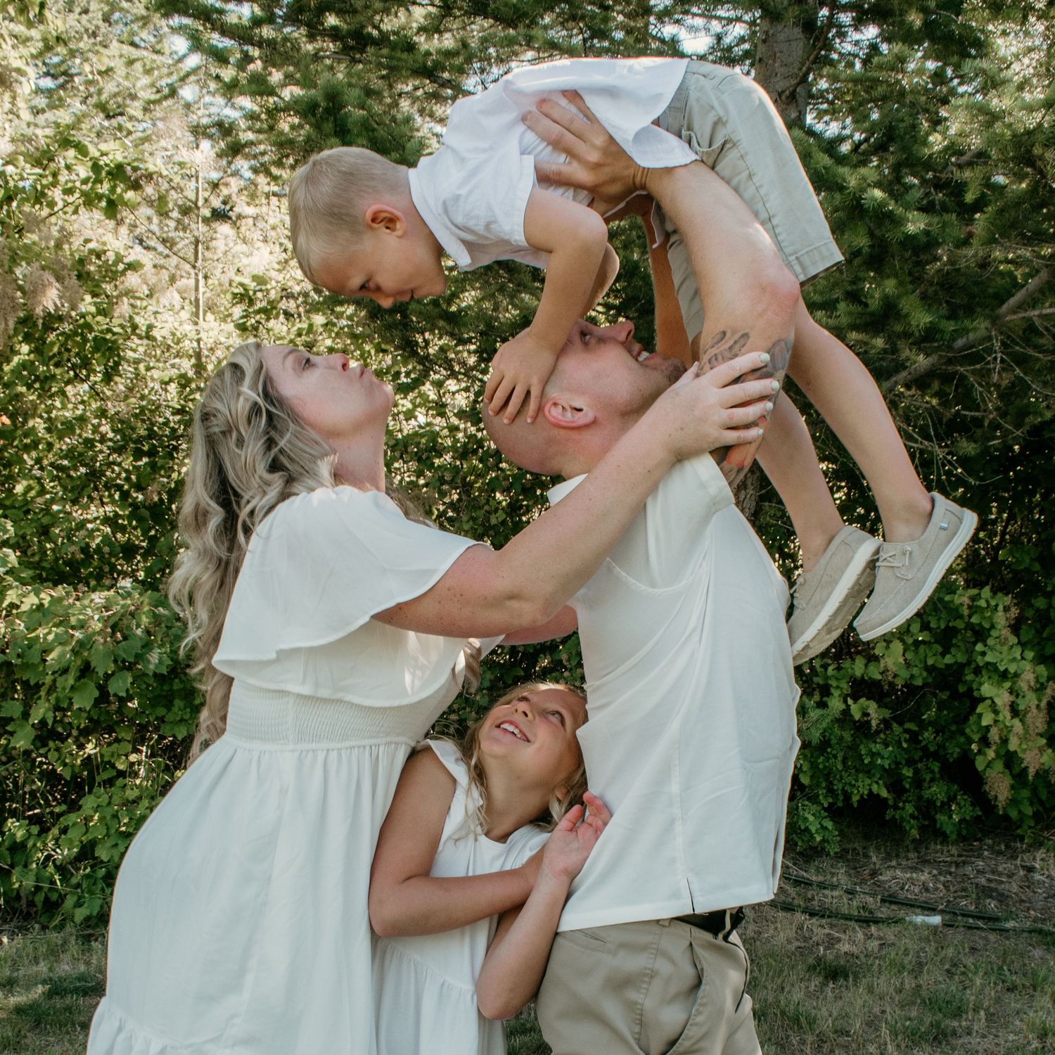 A couple shares playful and intimate moments outdoors in a series of candid photographs.