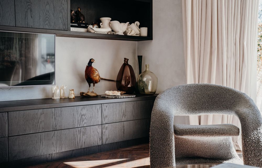 A collection of modern interior design photos showing gray furniture, wooden accents, and minimalist decor in a living space.