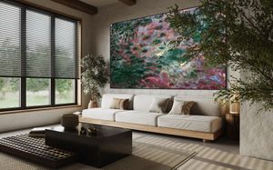 Modern living room features a vibrant floral wall art piece complemented by a white sofa and natural light. Monet Kim ahonoukoun  legacy