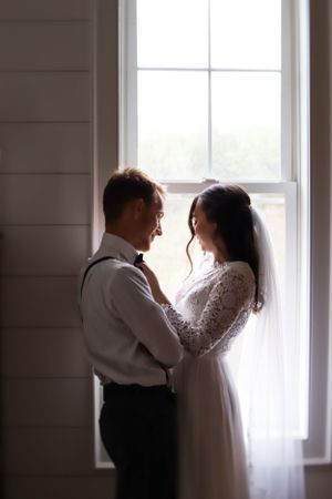 bride and groom couple portrait low light romantic moody