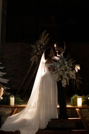 bride and groom candlelight