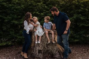 Family photo, with everyone looking at each other.