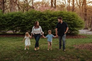 family walks, looking at each other